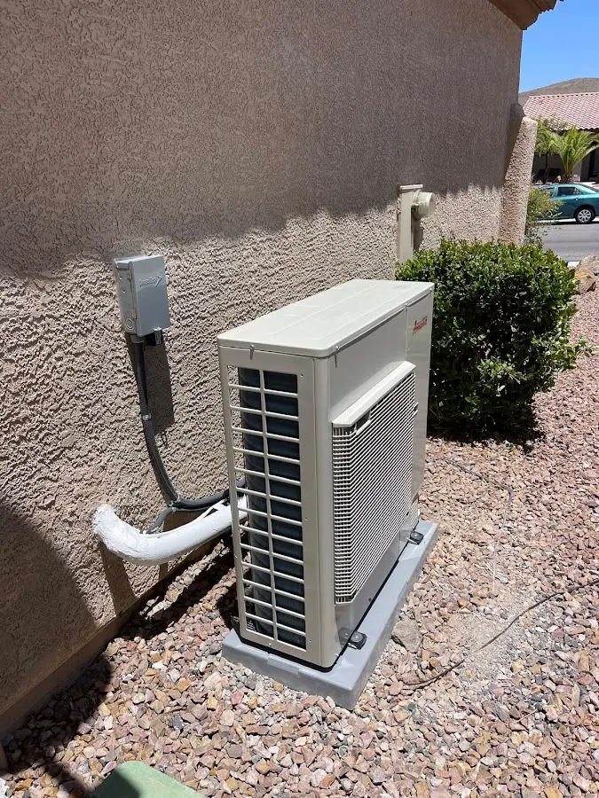 Residential air conditioning condenser unit in Spring Creek